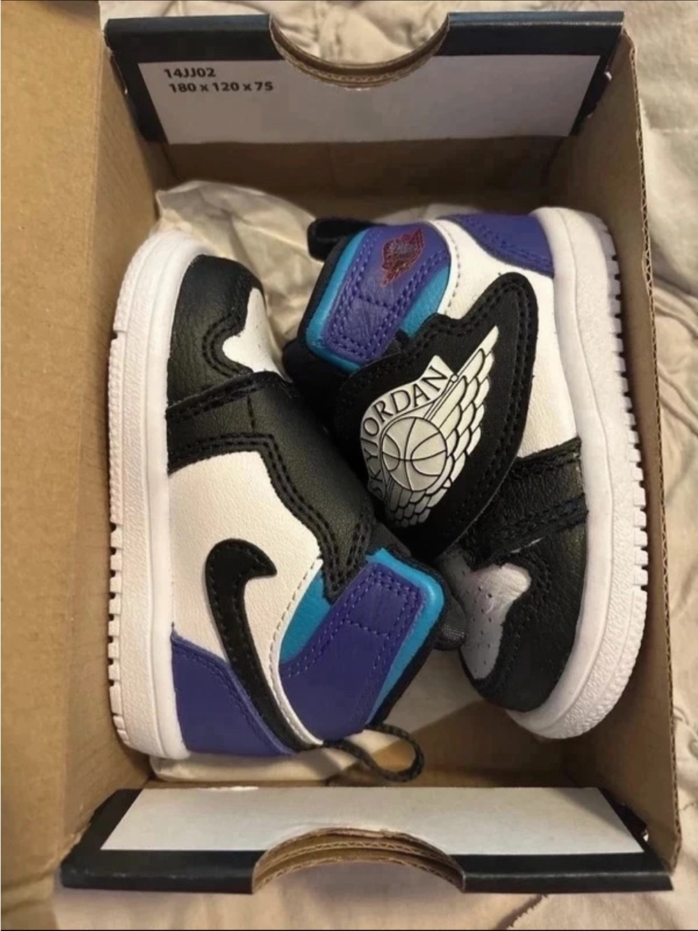 Jordan Kids High-Top Sneakers in White, Black, Purple & Teal